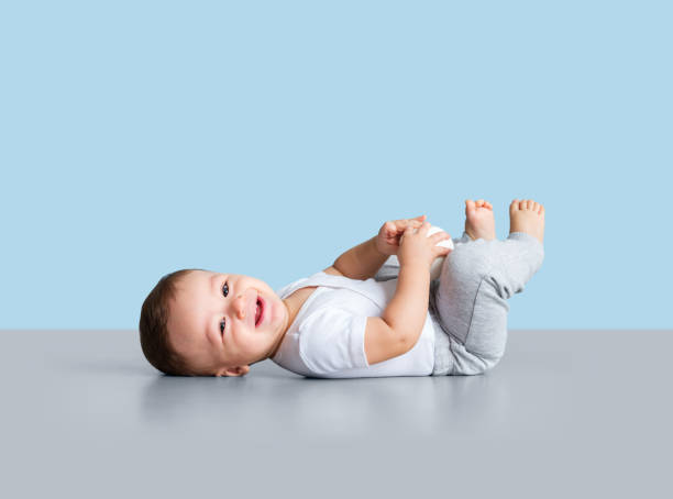 istock Cheerful baby boy smiling at the camera 1168249845