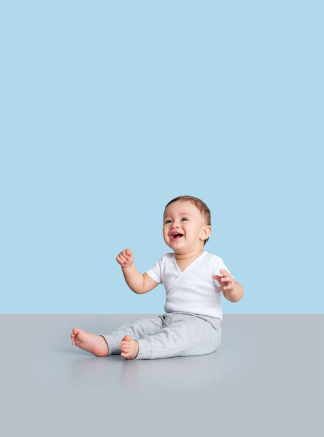 istock Smiling baby boy looking away from camera 1168249869
