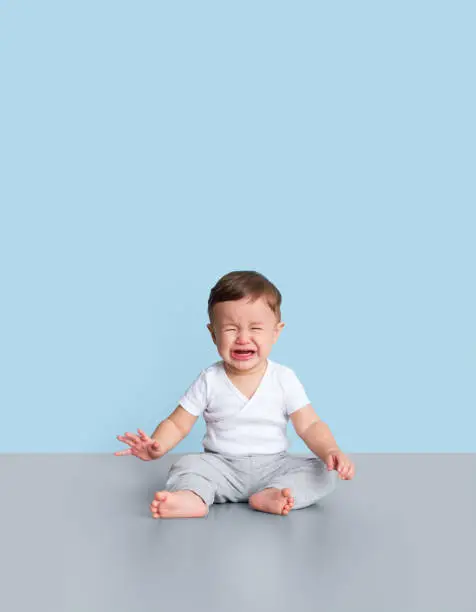 Photo of Young toddler crying