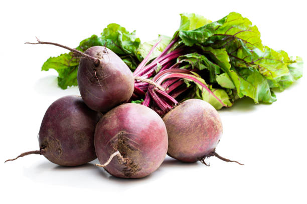 Bunch of new beetroots isolated on white Bunch  of new beetroots isolated on white common beet photos stock pictures, royalty-free photos & images