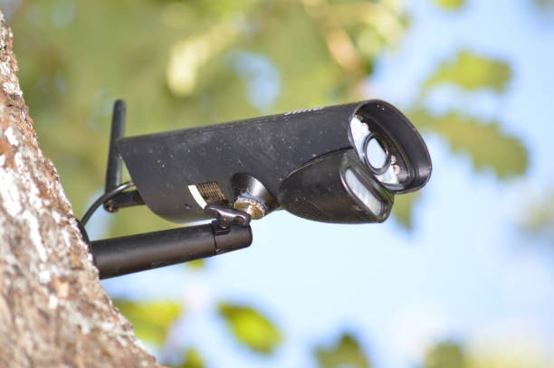 istock Closeup on a video surveillance camera 1168252035