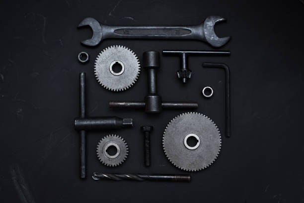 istock Square layout of different tools on dark background. Wrench tools, gear wheels, ring spanners, monkey wrenches, cogwheel, screws and bolts. Father's Day concept. Do it yourself. Flat lay 1168252695