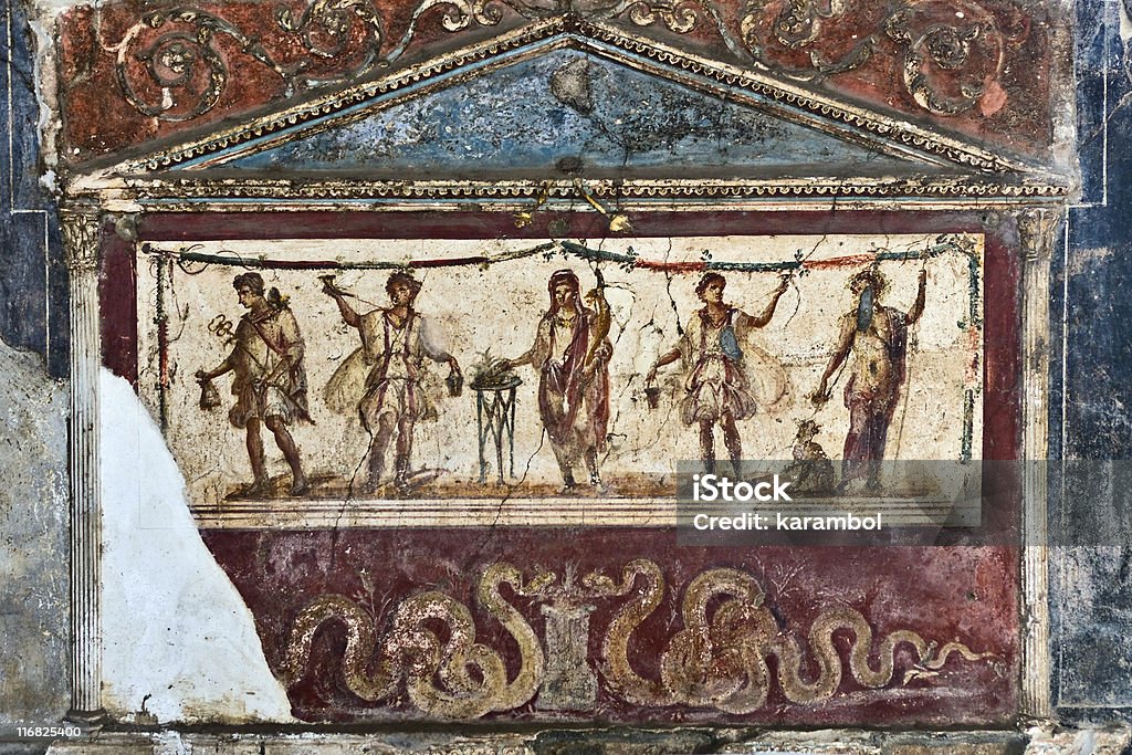 Fresco in ancient tavern, Pompeii, Italy Lararium fresco in atrium of ancient tavern, Via dell Abbondanza, Pompeii, Italy Fresco Stock Photo