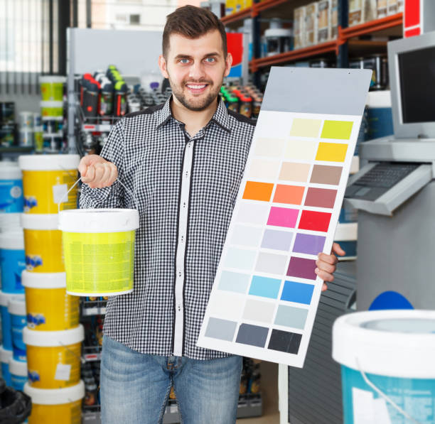 istock Man choosing color for painting 1168254695