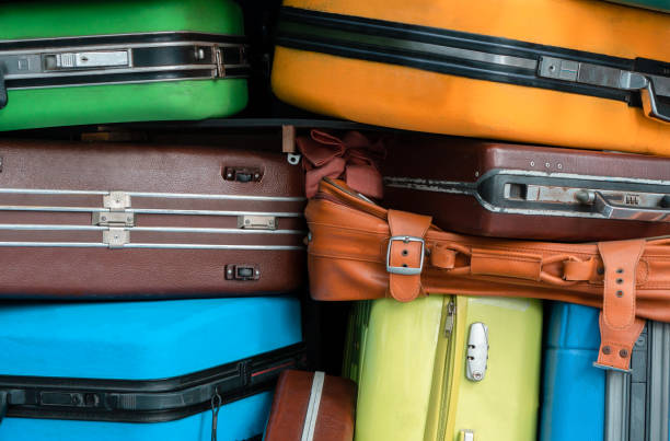 istock Stack of colourful suitcase at terminal for holiday trips background 1168254909