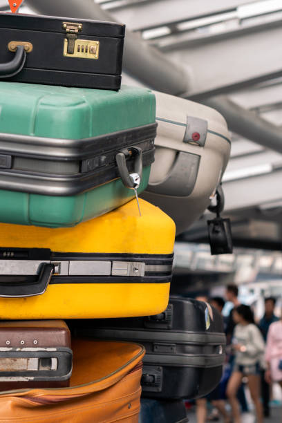 istock Colourful Suitcase at terminal of airport 1168255496