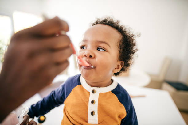 istock Toddler eating yogurt 1168255917