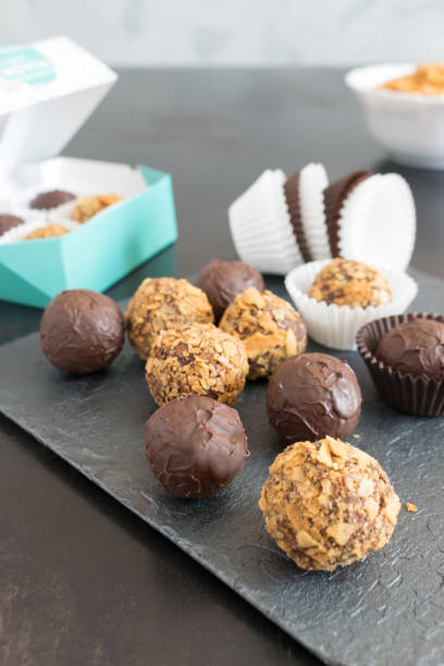 istock chocolate truffles in glaze and wafer crumb 1168260893