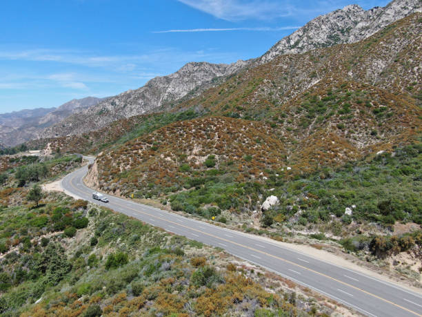 istock Asphalt road bends through Angeles National forests mountain 1168265414
