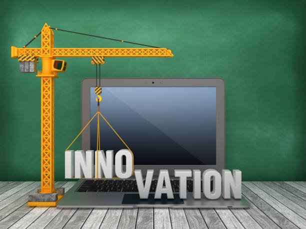 istock Tower Crane and Laptop with INNOVATION Word on Chalkboard Background - 3D Rendering 1168266070