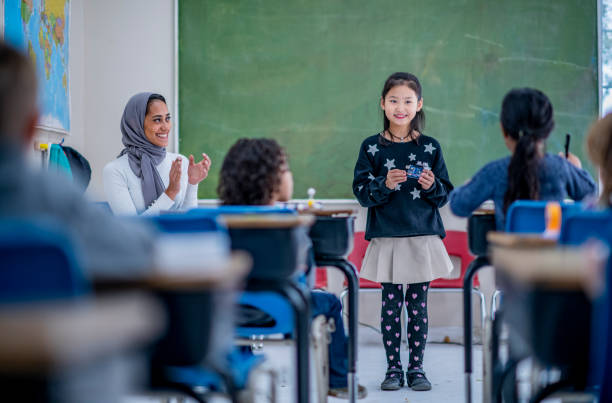 istock Little girl giving a presentation 1168266812