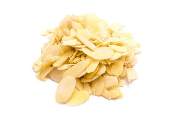 istock Almond slices isolated on white background 1168268520