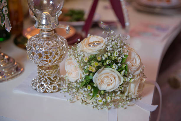 istock Rings on wedding bouquets . Stylish white wedding flower . 1168271128