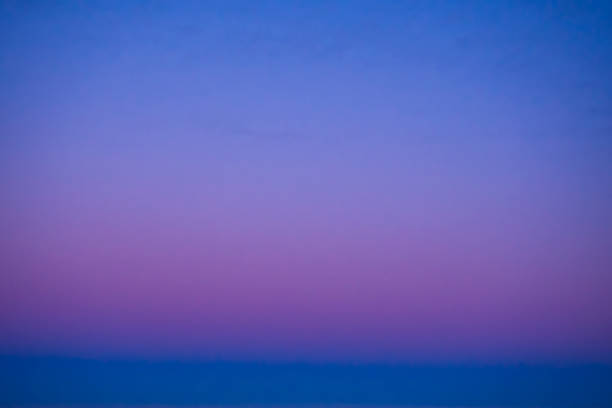 istock Gradient of the evening cloudless sky, blue and pink colors 1168271221