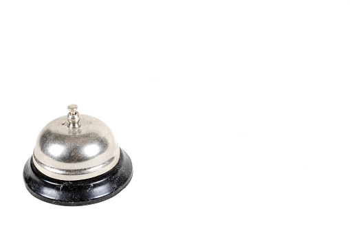 A metal reception bell isolated on a white background