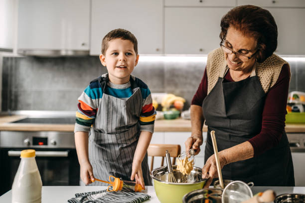 istock Let's your granny show you how to make a cake 1168274213