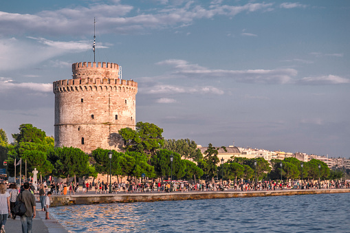 Thessaloniki, Greece - July 24, 2018: The White Tower of Thessaloniki on the north shore of the Aegean Sea, Greece. The tower was built as a fortification by Ottoman Sultan Murad II.