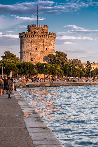 Thessaloniki, Greece - July 24, 2018: The White Tower of Thessaloniki on the north shore of the Aegean Sea, Greece. The tower was built as a fortification by Ottoman Sultan Murad II.