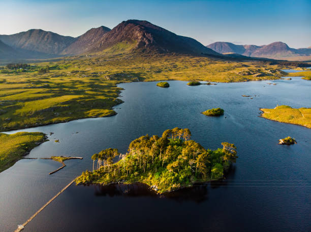 istock Twelve Pines Island, standing on a gorgeous background formed by the sharp peaks of a mountain range called Twelve Pins or Twelve Bens, Connemara, County Galway, Ireland 1168281404
