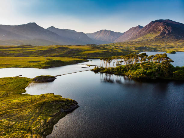 istock Twelve Pines Island, standing on a gorgeous background formed by the sharp peaks of a mountain range called Twelve Pins or Twelve Bens, Connemara, County Galway, Ireland 1168281442
