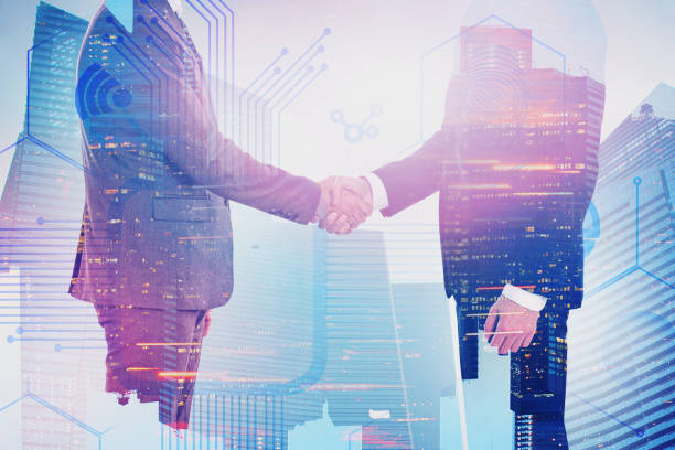 istock Handshake of business people, digital interface 1168281672
