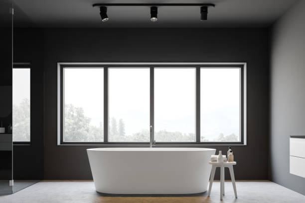 istock Gray bathroom interior with tub 1168281742