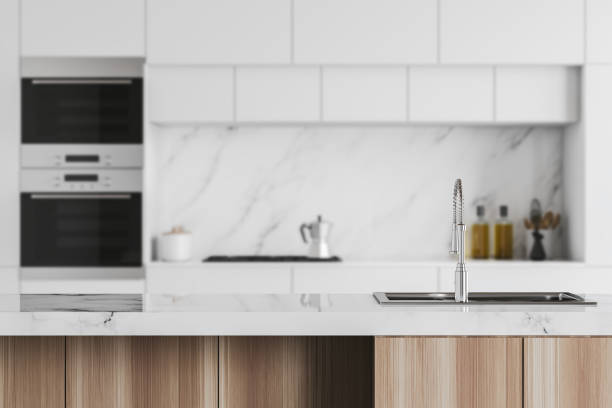 istock Wooden countertop in marble kitchen interior 1168281759