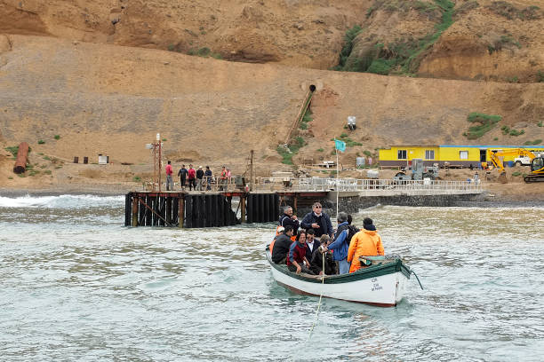 One of the tiny ferries that move people between the airport and the main town, San Juan Bautista, on Isla Robinson Crusoe, Chile.