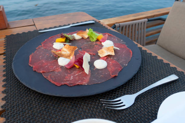 istock Dinner tables near the sea 1168283983