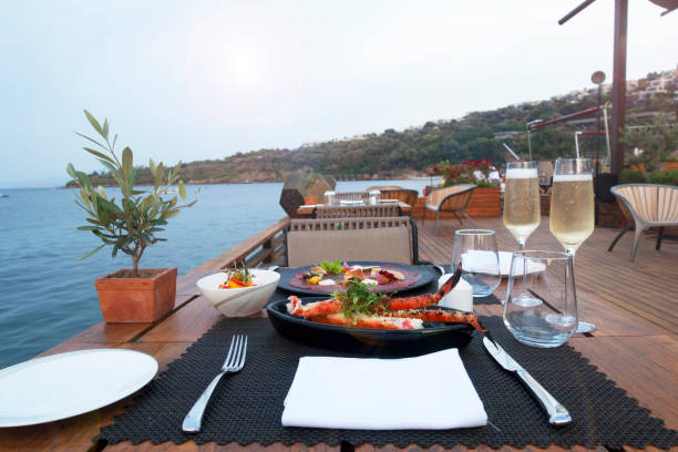 istock Dinner tables near the sea 1168284515