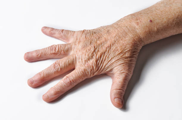 istock Old grandmother's hand isolated on a white background. Hand isolated on white background, copy space 1168284596