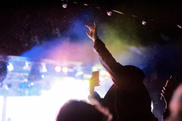 istock Smartphone at D J concert in the snow 1168285448