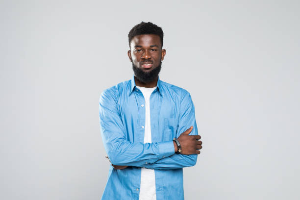 istock Portrait of young african man isolated over white Background 1168285607