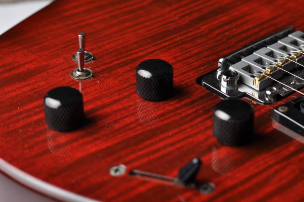 istock Red guitar isolated on white background. 1168285623