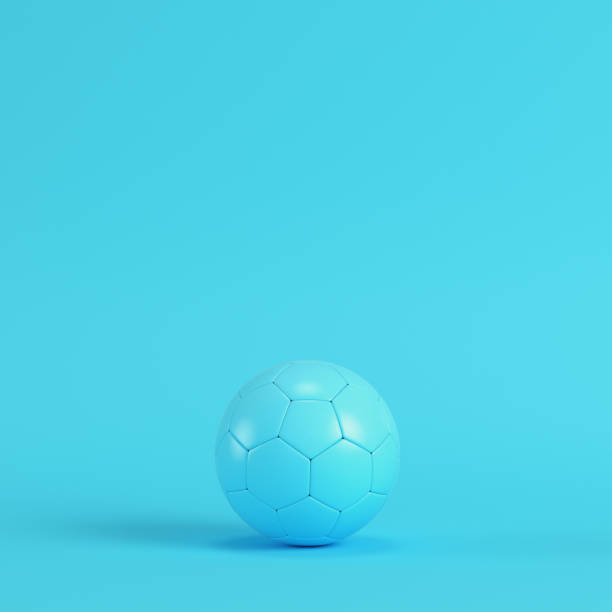istock Soccer ball on bright blue background in pastel colors 1168287070