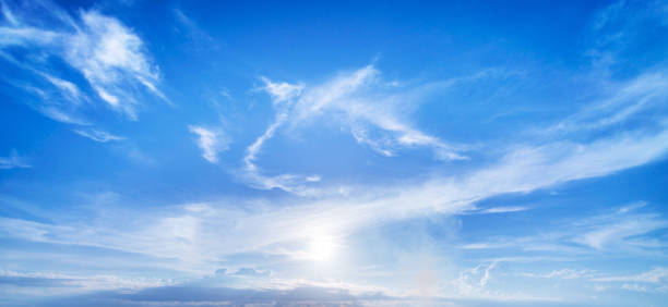 istock Majestic sun and clouds on blue sky 1168288593
