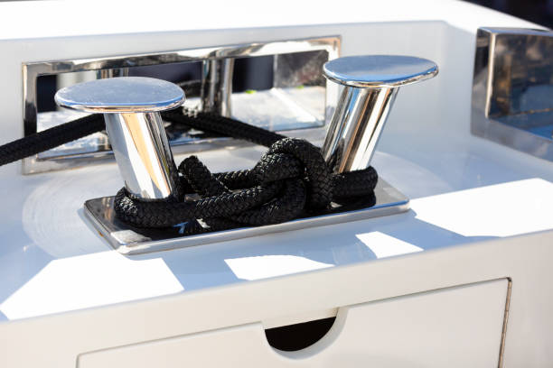 istock Stainless steel cleat with black hawser, background with copy space 1168289767