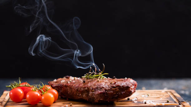 istock steakhouse menu striploin steak beef meat rosemary 1168294588