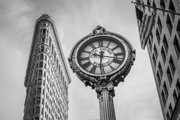 The Flatiron Building and the Fifth Avenue Tiffany's Clock. B&W