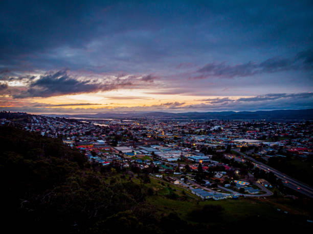 Launceston Tasmania Dusk Looking north west over launceston tasmania at sunset launceston tasmania stock pictures, royalty-free photos & images