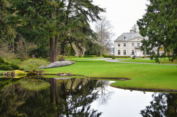 Bainbridge Island, Washington United States - April 9th, 2017: An overcast spring day at Bainbridge Island, it is the Bloedel Reserve  estate with the mansion and garden pond.