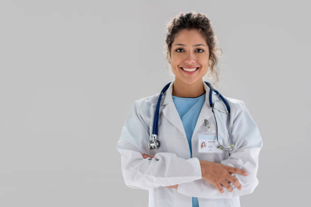 istock Female doctor looking at the camera smiling 1168301434