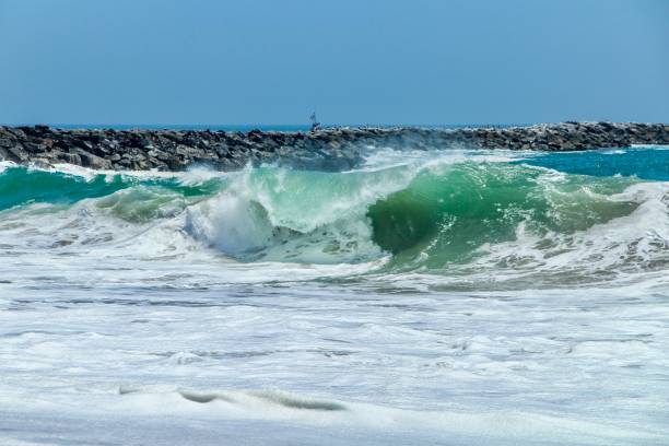 istock Wave curling and crashing into the ocean 1168306336