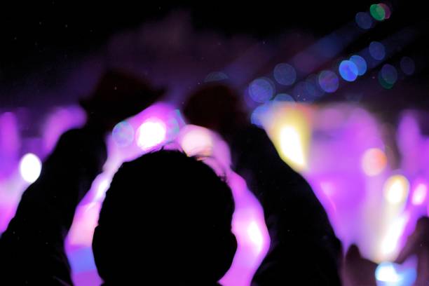 istock Defocussed Hands at D J concert in the snow 1168307524