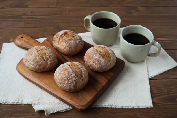 istock french rye bread with cups of coffee on wooden table 1168312985