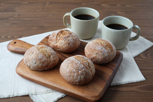 istock french rye bread with cups of coffee on wooden table 1168313076