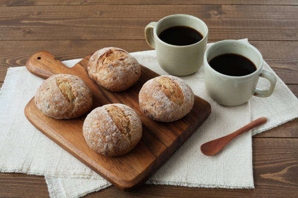 istock french rye bread with cups of coffee on wooden table 1168314792