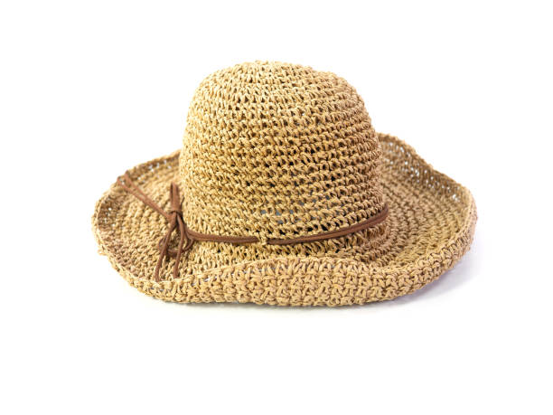 istock Vintage straw hat, partly open woven, isolated on white background. Straight front view, Womens summer yellow straw hat with the ribbon 1168314850