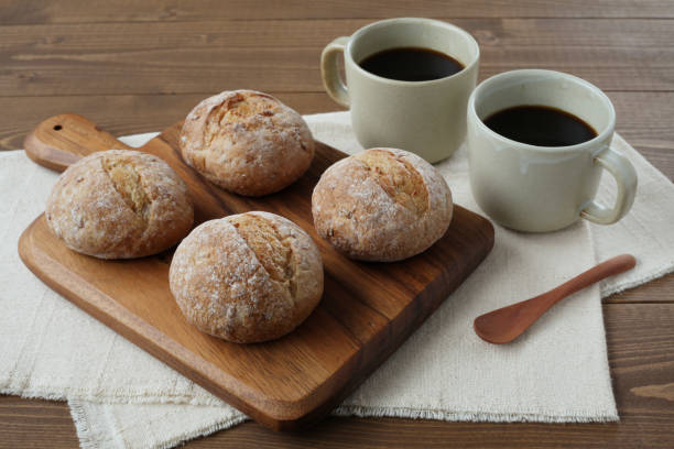istock french rye bread with cups of coffee on wooden table 1168314887