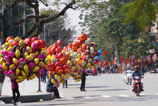 Haiphong, Vietnam - February 07, 2016 : some people sightseeing on street in Tet Holiday at HaiPhong,Vietnam.